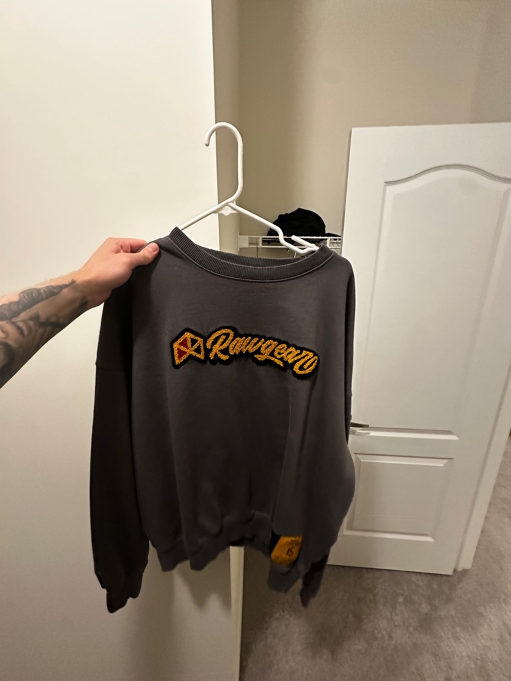 Charcoal Gray Crewneck Sweater with Yellow Script Patch